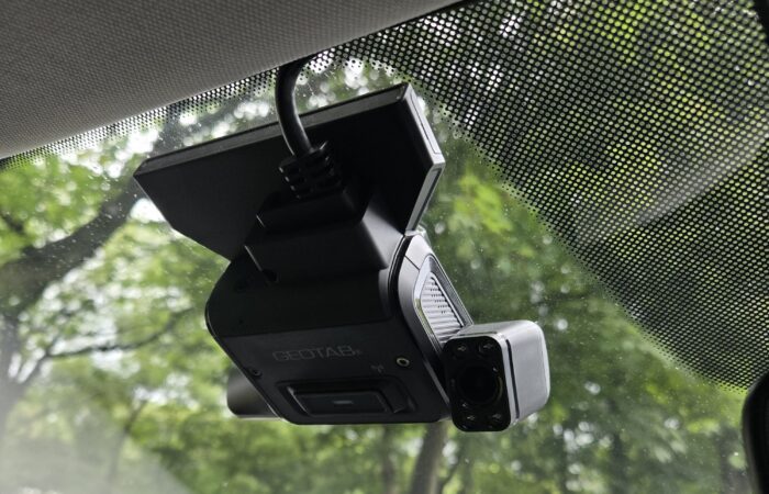 In-vehicle CCTV and dashcam fitted beside the windscreen of a Myle-owned vehicle.