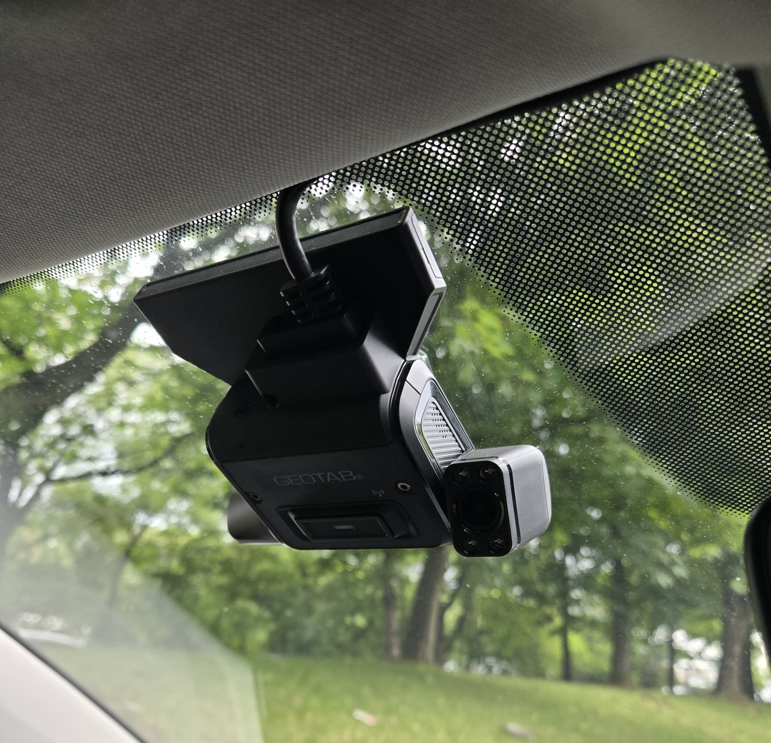 In-vehicle CCTV and dashcam fitted beside the windscreen of a Myle-owned vehicle.